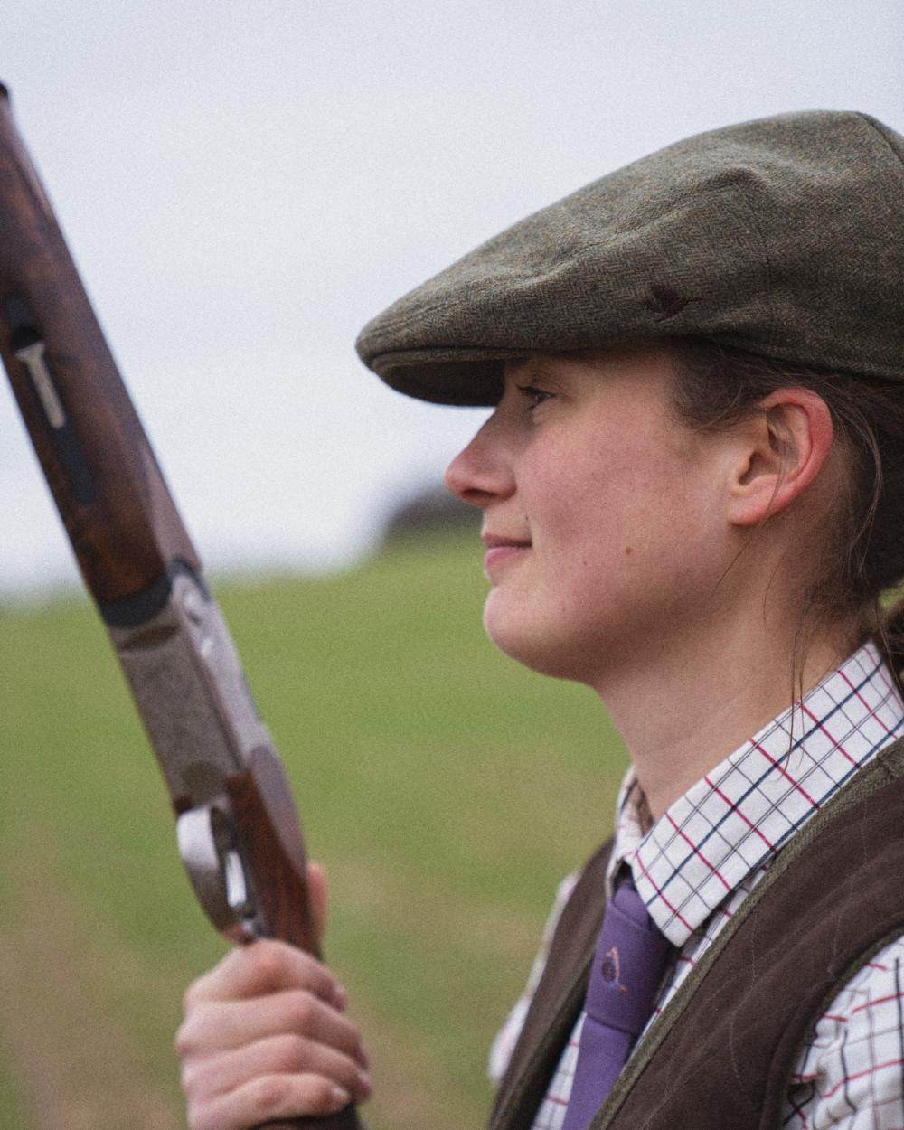 Moss Green Coloured Seeland Hillside Sixpence Cap on outdoor background