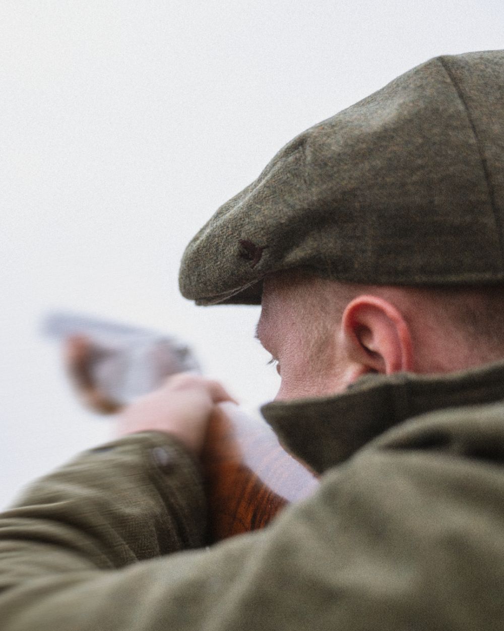 Moss Green Coloured Seeland Hillside Sixpence Cap on outdoor background