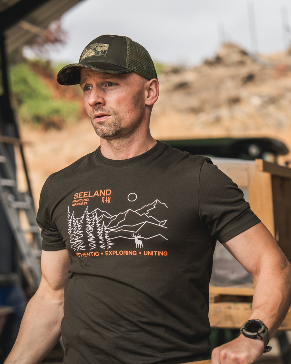 Pine Green Coloured Seeland Landscape T-Shirt on outdoor background