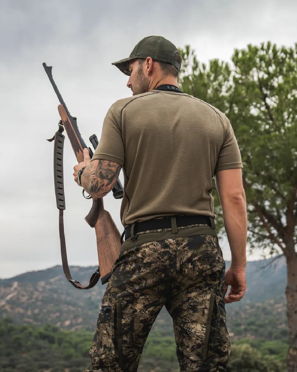Covert Green Coloured Seeland Mens Apex Merino T-Shirt on mountain background