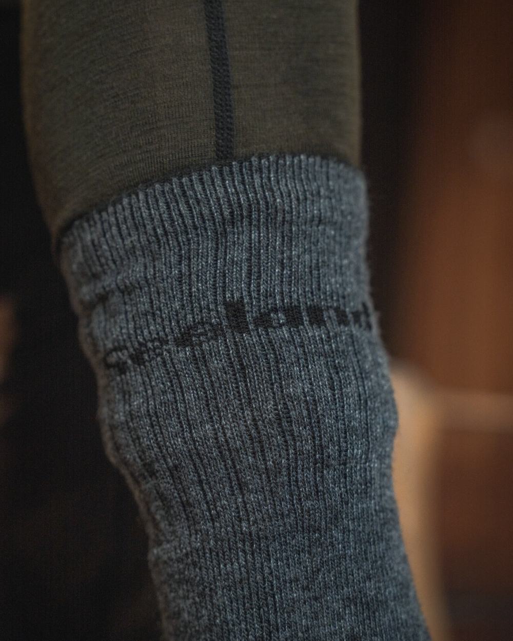 Pine Green Coloured Seeland Mens Apex One Hundred Long Johns on outdoor background