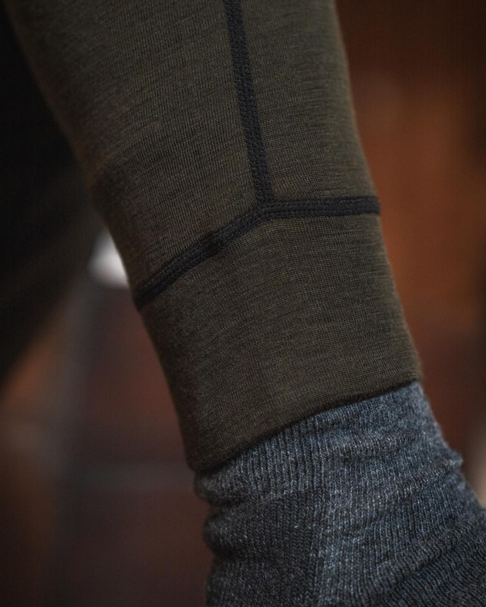 Pine Green Coloured Seeland Mens Apex One Hundred Long Johns on outdoor background