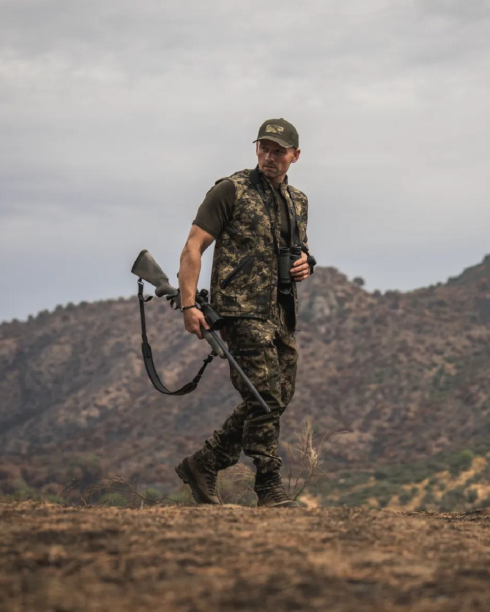 InVis MPC Green Coloured Seeland Mens Chaser Aero Camo Waistcoat on mountain background
