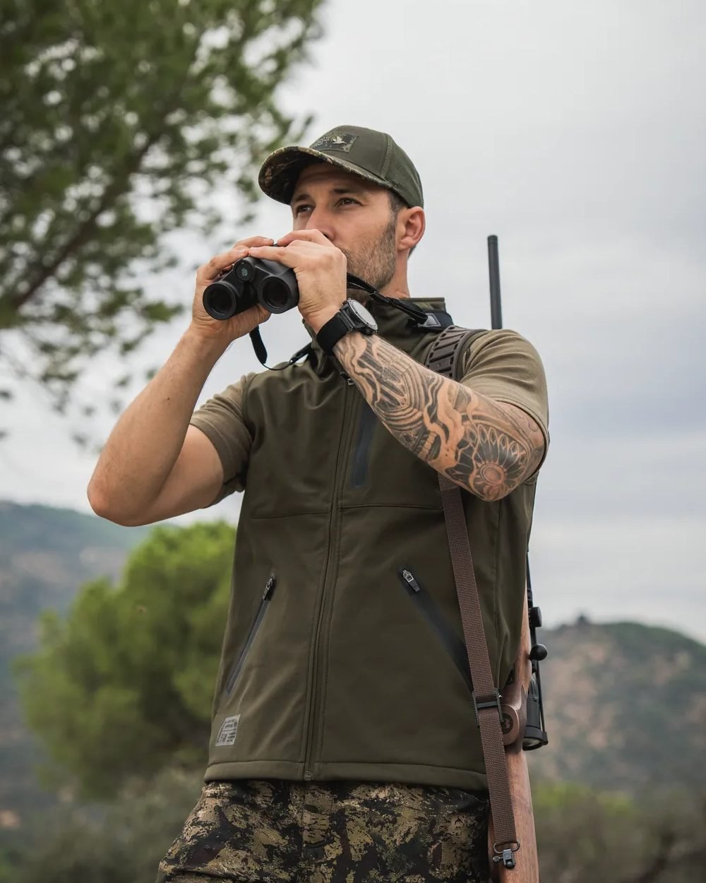 Pine Green Coloured Seeland Mens Chaser Aero Waistcoat on mountain background