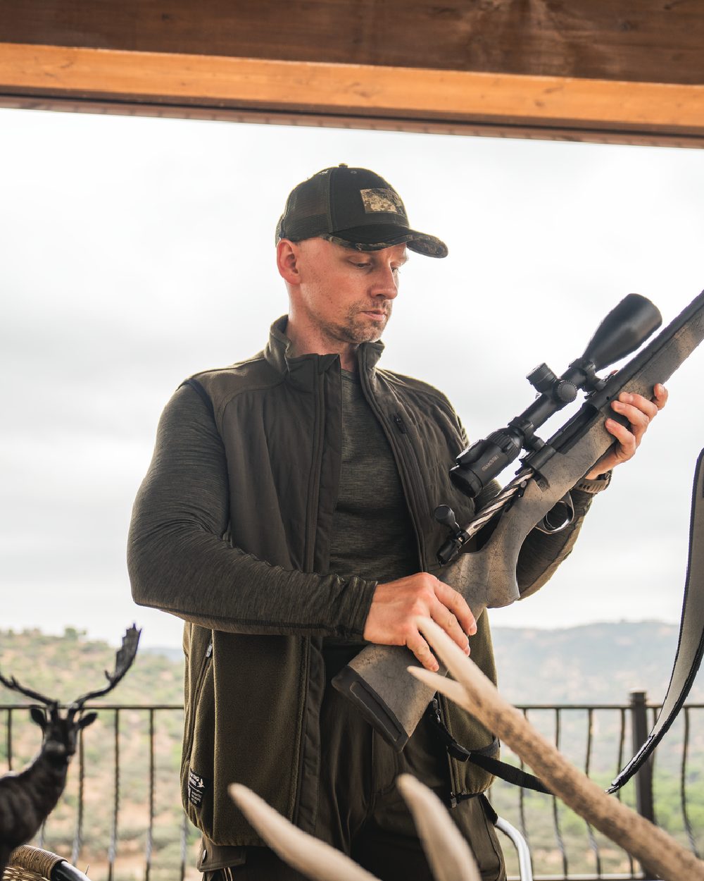 Pine Green Coloured Seeland Mens Gale Fleece Waistcoat on outdoor background