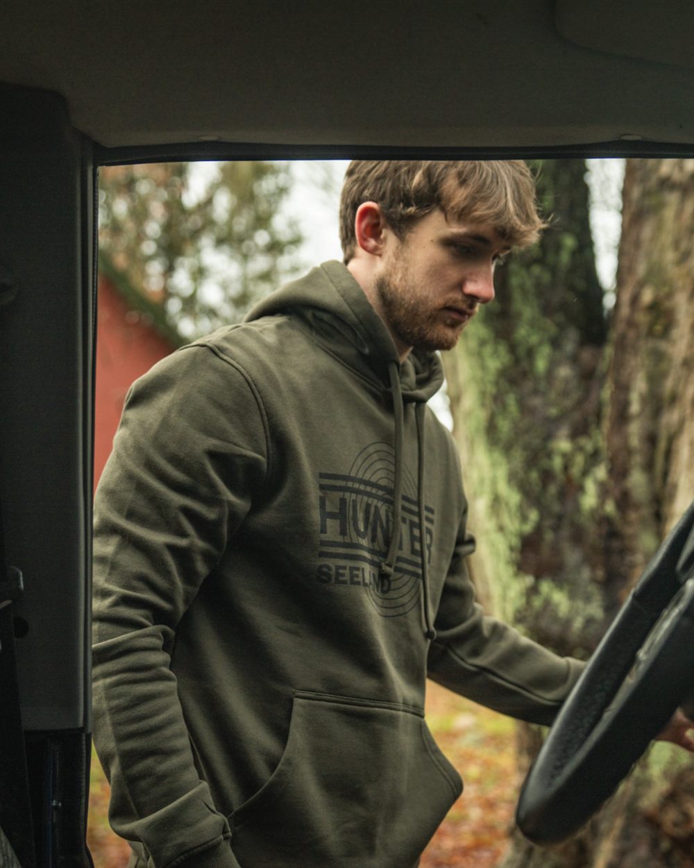 Pine Green Coloured Seeland Mens On Point Hoodie on outdoor background