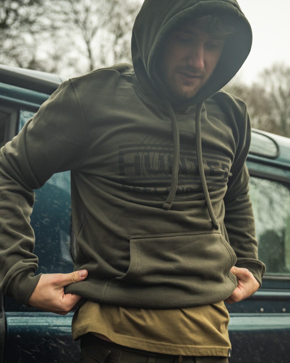 Pine Green Coloured Seeland Mens On Point Hoodie on outdoor background