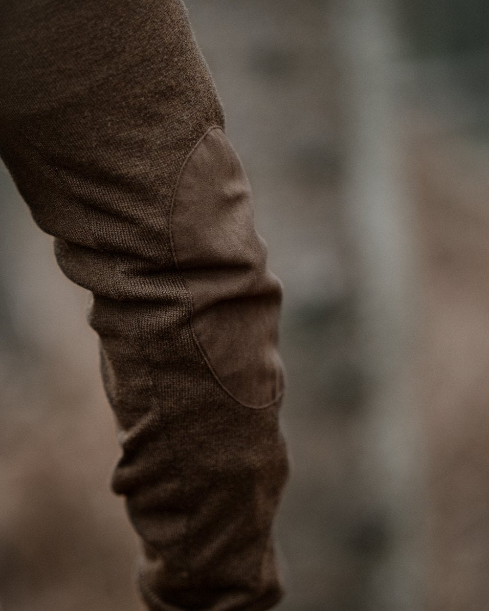 Dark Brown coloured Seeland Mens Pine Half Zip Sweater on forest background