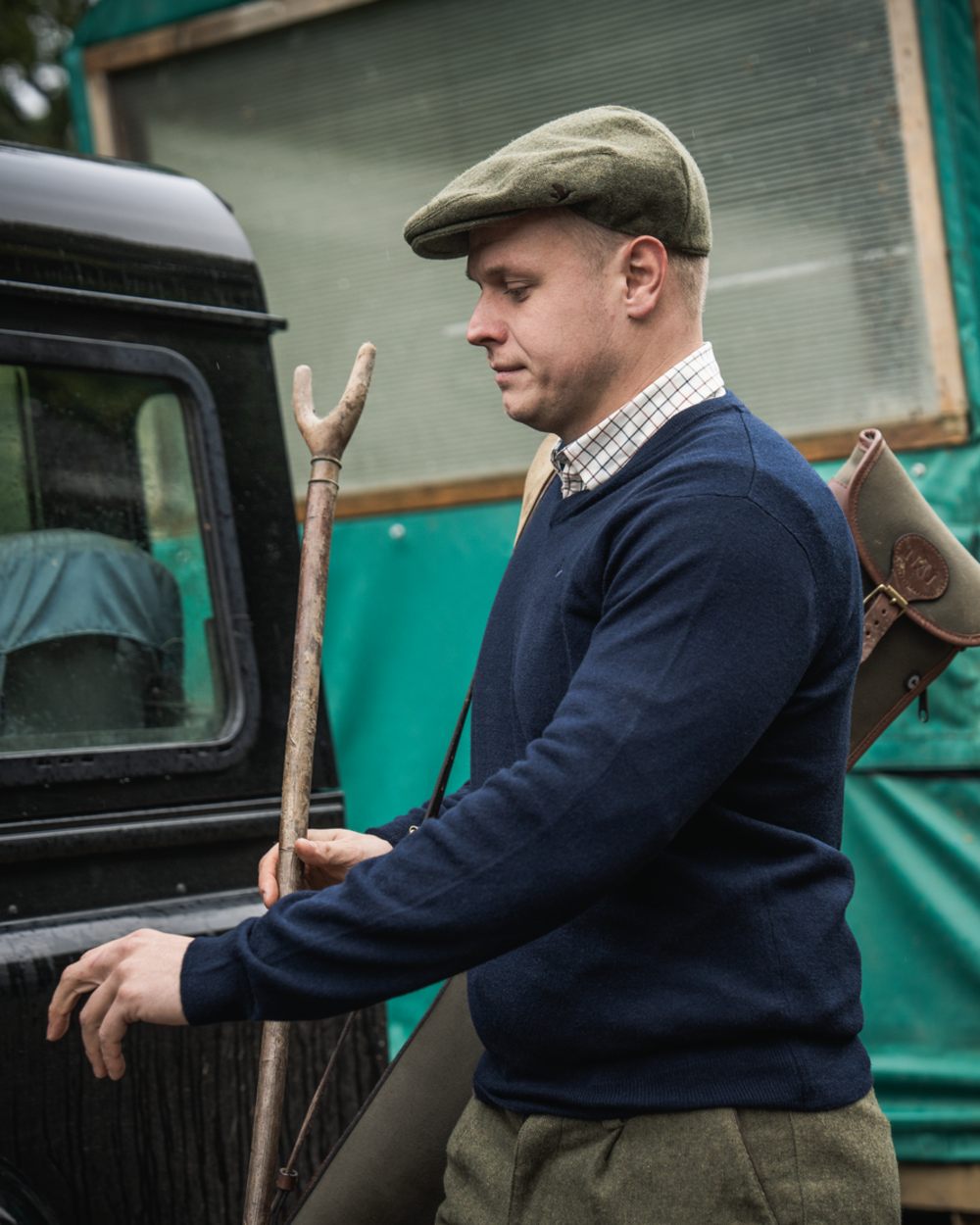 Dark Sapphire Coloured Seeland Mens Pine V-Neck Pullover on outdoor background