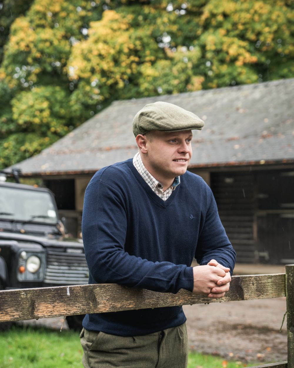 Dark Sapphire Coloured Seeland Mens Pine V-Neck Pullover on outdoor background