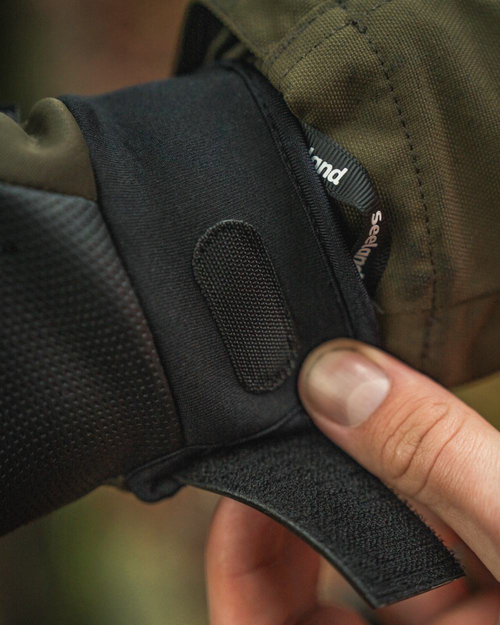 Pine Green Coloured Seeland Mens Target Gloves on outdoor background