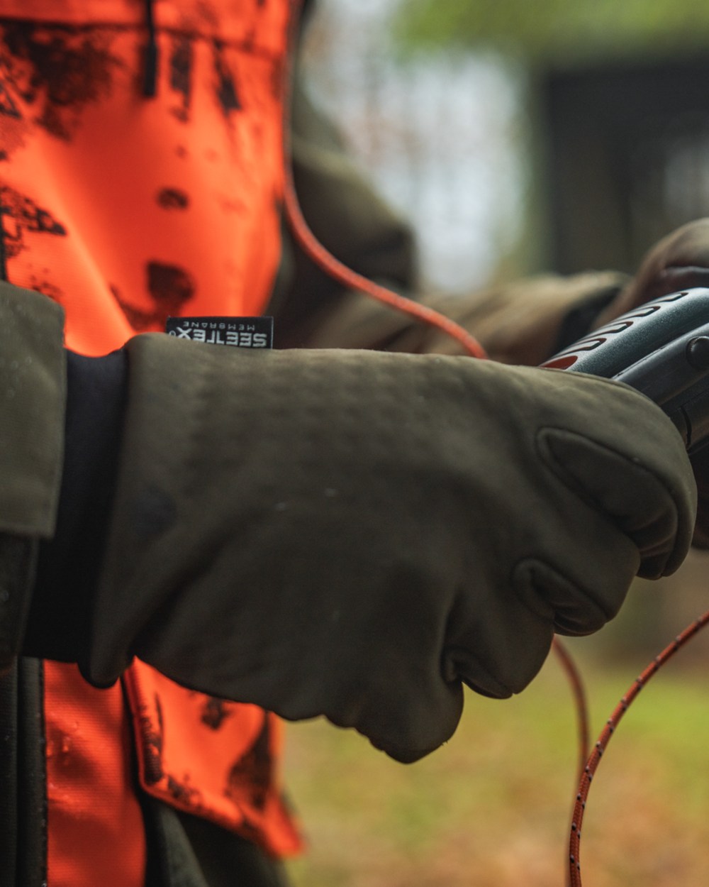 Pine Green Coloured Seeland Mens Target Gloves on outdoor background
