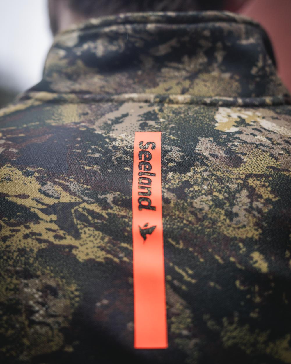 InVIS MPC Green Coloured Seeland Mens Tidal Camo Fleece Jacket on forest background