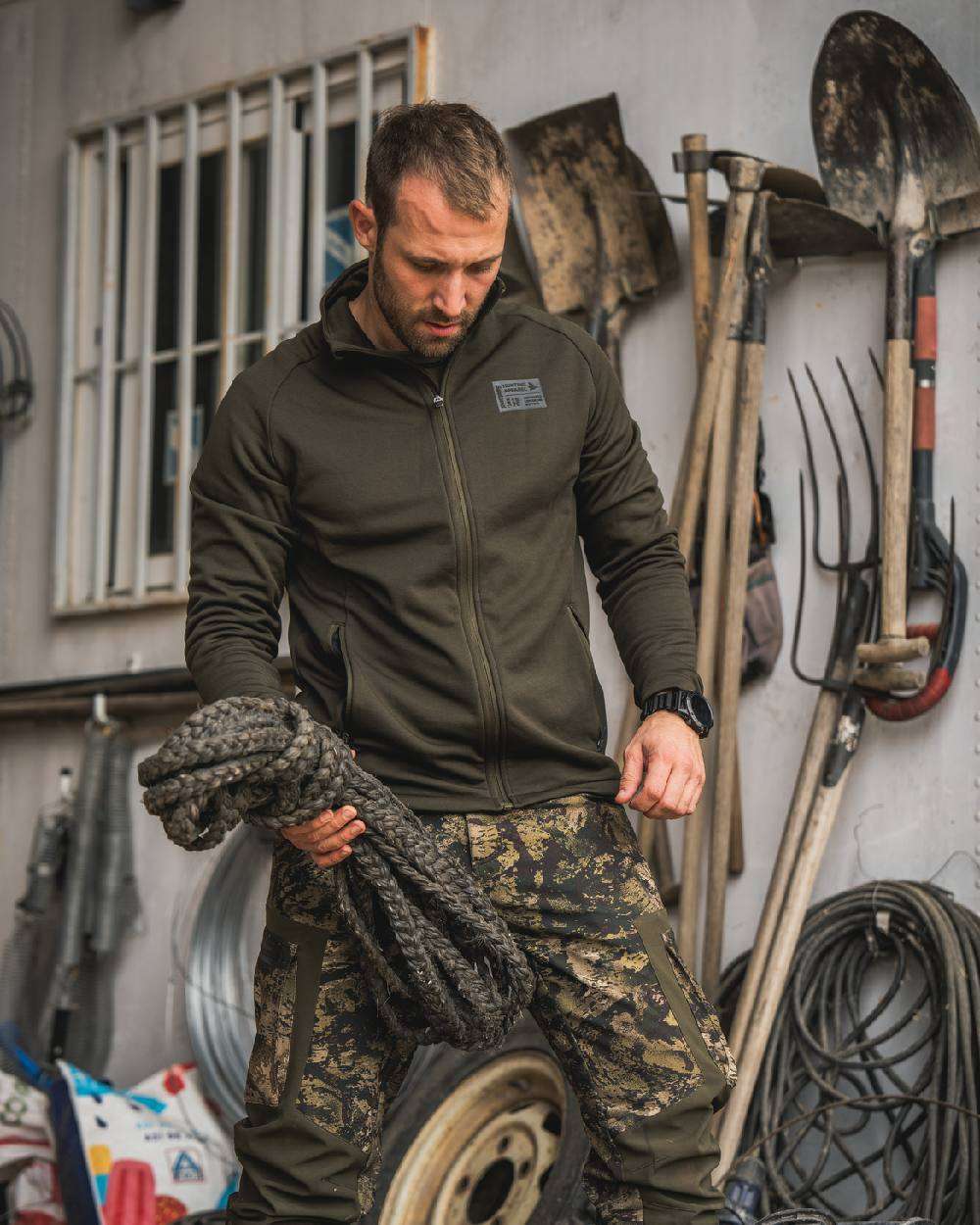 Pine Green Coloured Seeland Tidal Fleece Jacket on Indoor Background