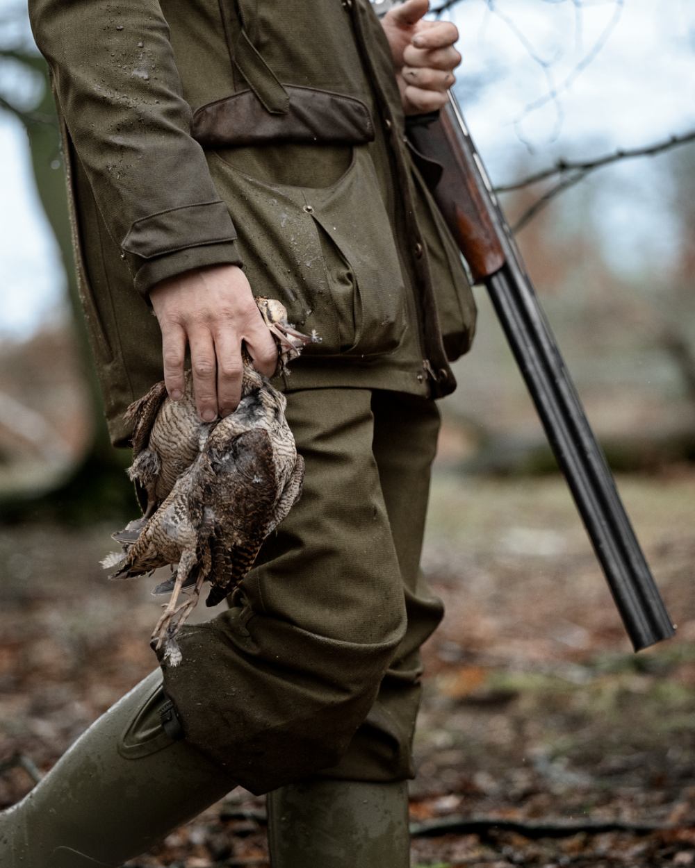 Shaded Olive coloured Seeland Mens Woodcock Royale Breeks on forest background