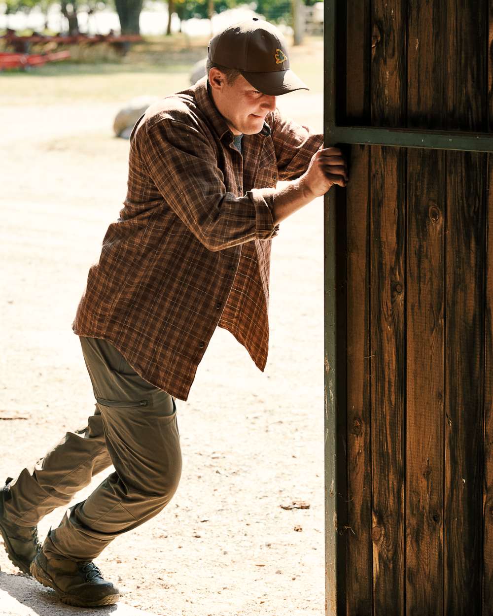 Pine Green Coloured Seeland Outdoor Stretch Trousers on outdoor background