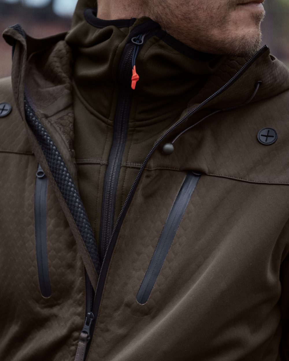 Pine Green coloured Seeland Power Fleece on forest background