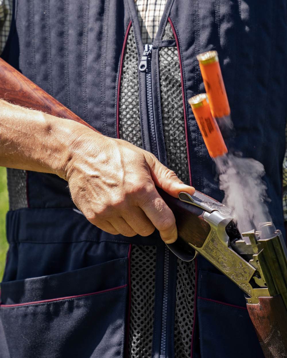 Classic Blue coloured Seeland Skeet II Waistcoat on forest background
