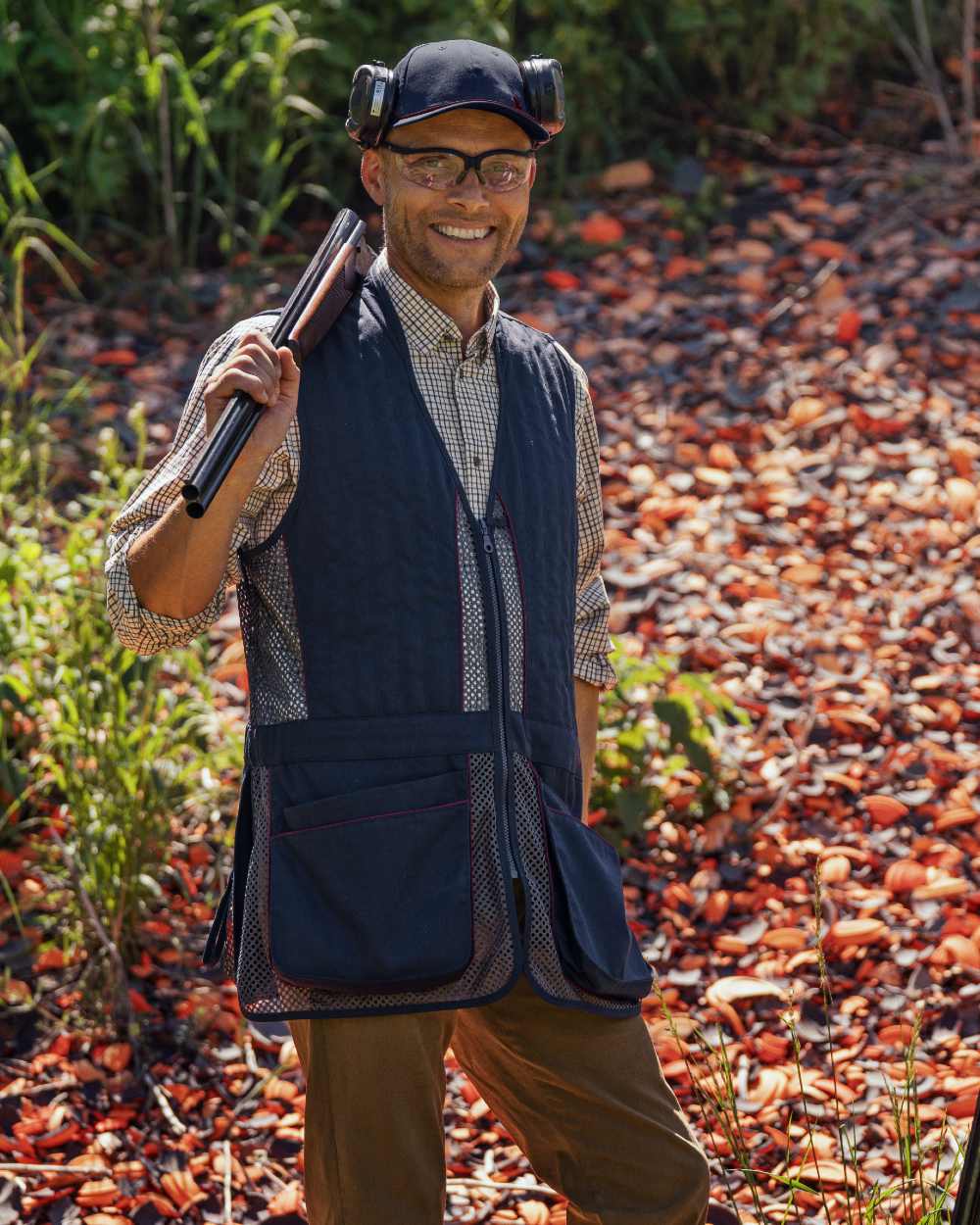 Classic Blue coloured Seeland Skeet II Waistcoat on forest background