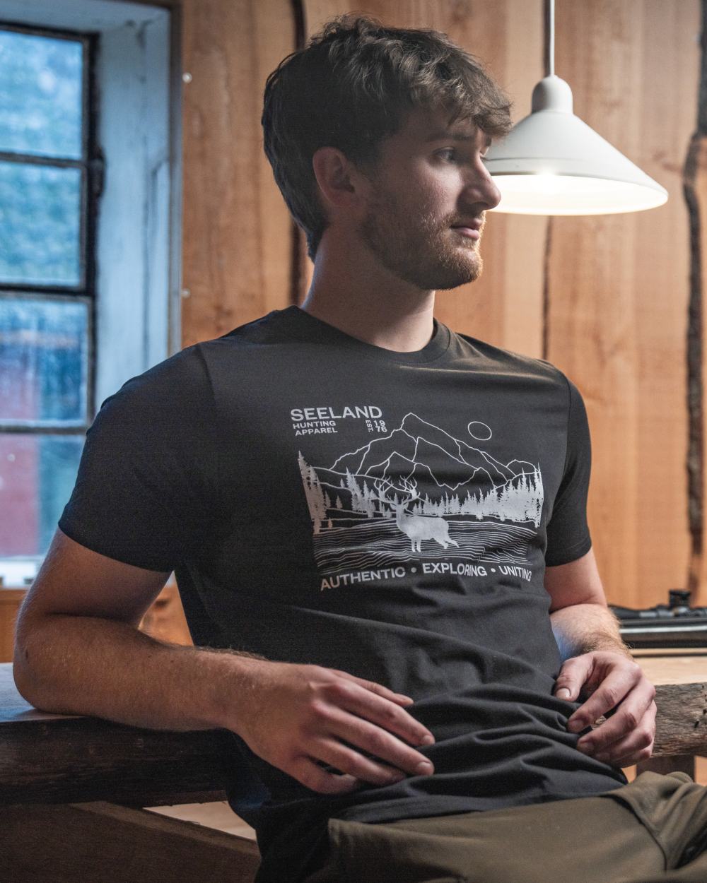 Black coloured Seeland Territory T-Shirt on outdoor background