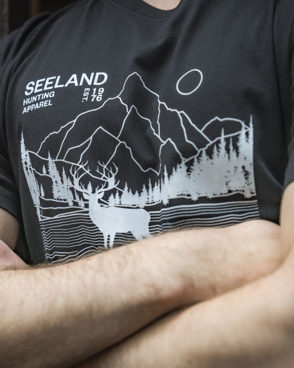 Black coloured Seeland Territory T-Shirt on outdoor background