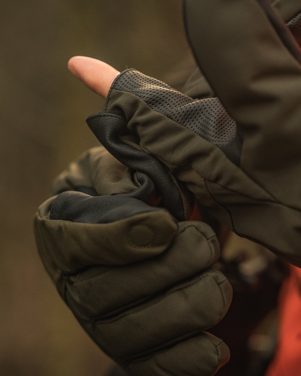 Pine Green coloured Seeland Trigger Fold-Back Gloves on forest background