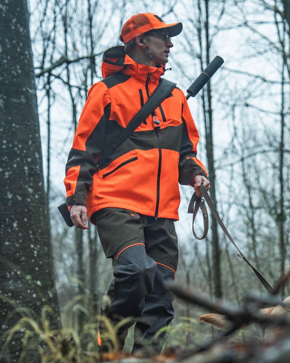 Orange Blaze coloured Seeland Venture Rover Cap on forest background