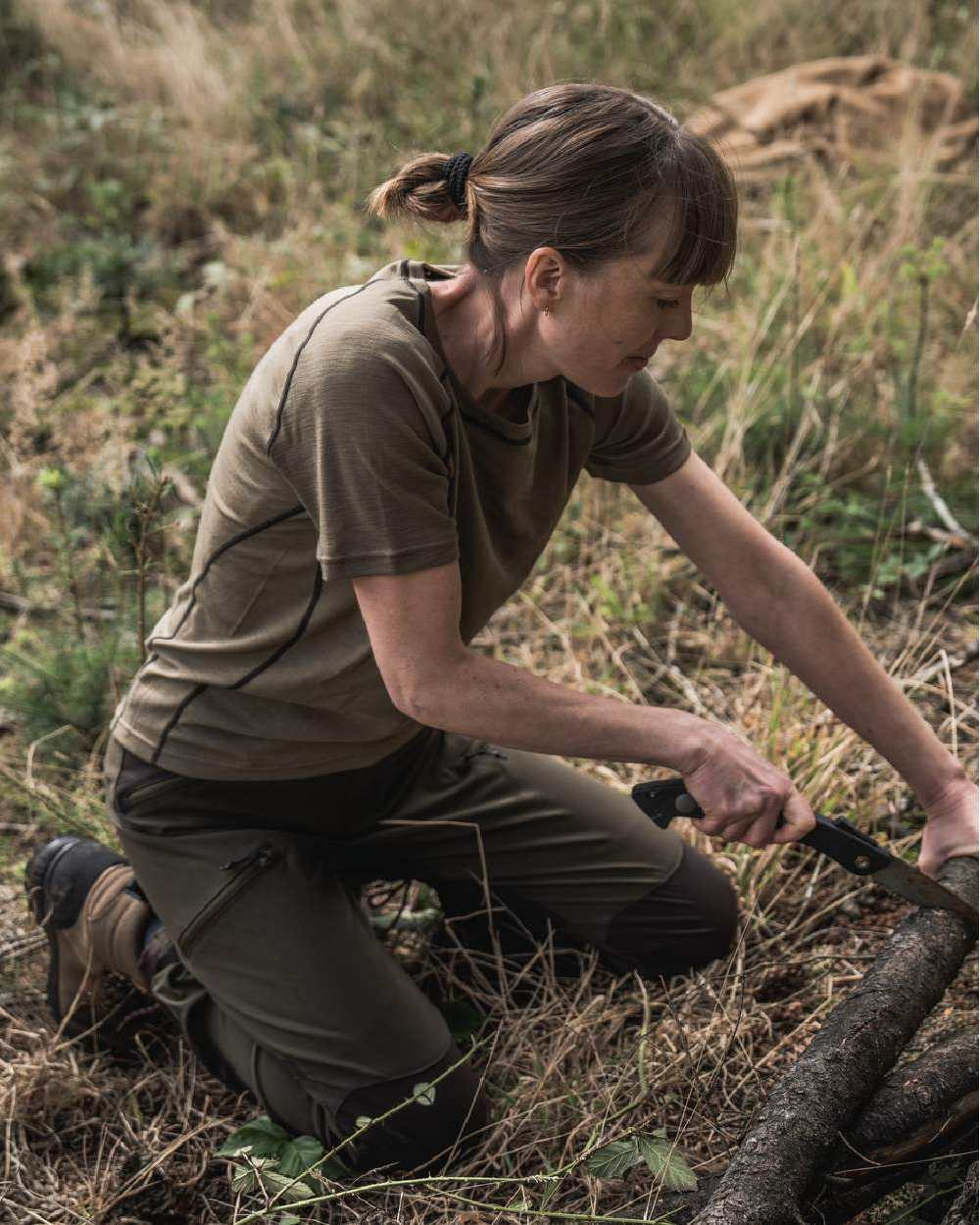 Covert Green Coloured Seeland Womens Apex Aia Merino T-shirt on outdoor background