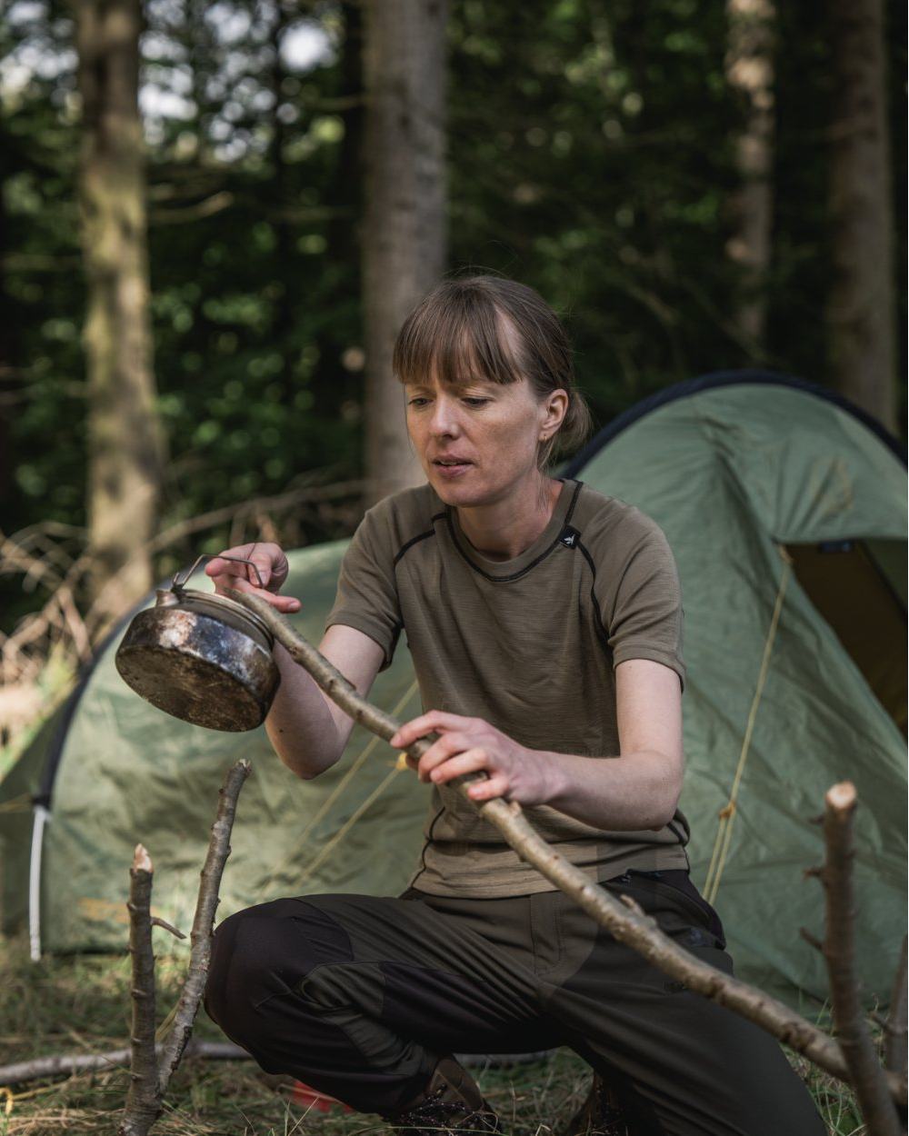 Covert Green Coloured Seeland Womens Apex Aia Merino T-shirt on outdoor background