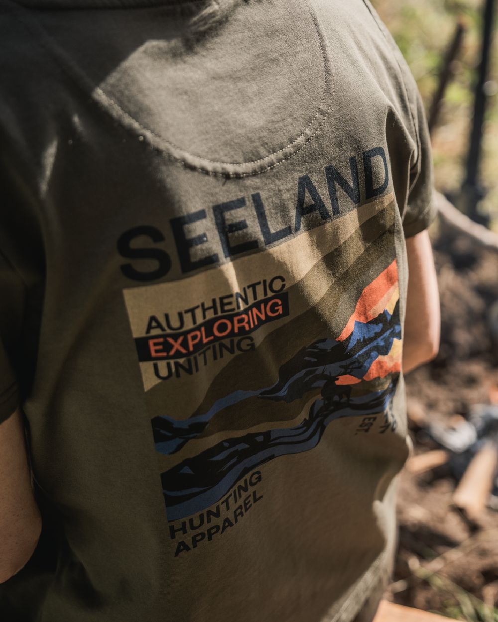 Grape Leaf Coloured Seeland Womens Leala T-Shirt on blurry background