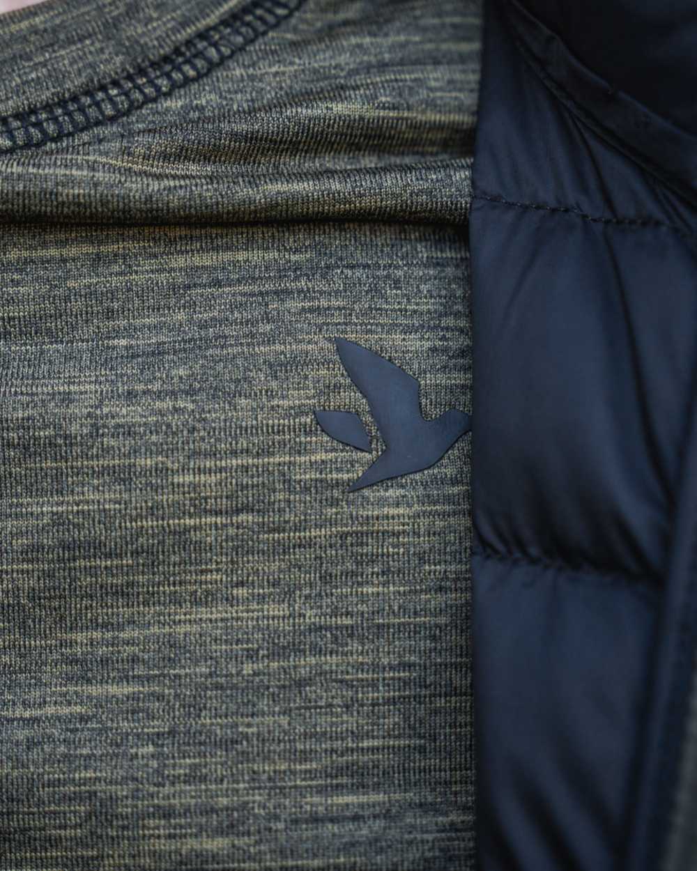 Military Olive Melange coloured Seeland Womens Peak Aia T-Shirt on forest background