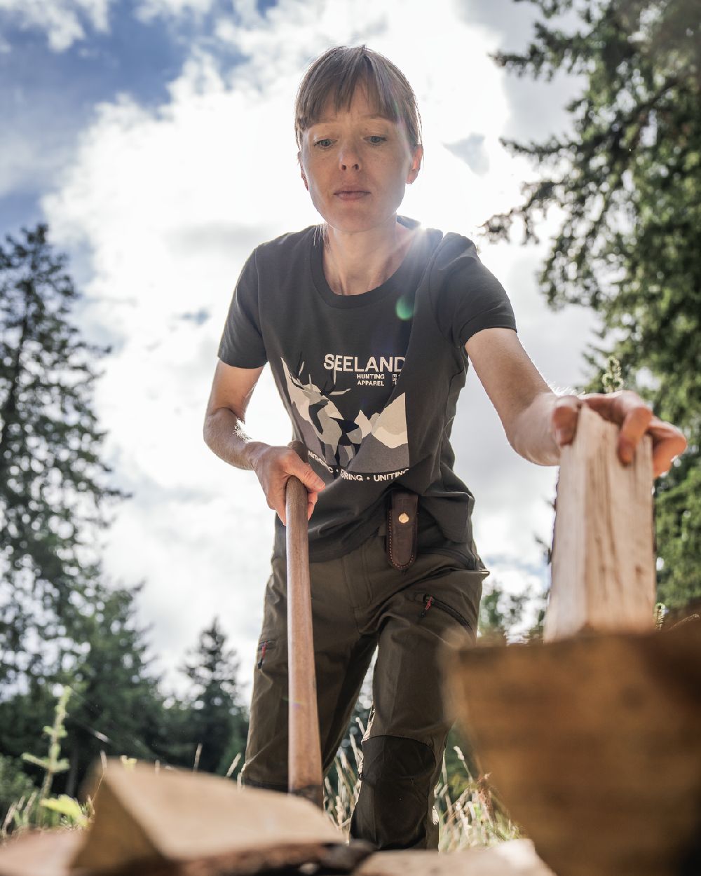 Pine Green Coloured Seeland Womens Sadie T-Shirt on forest background