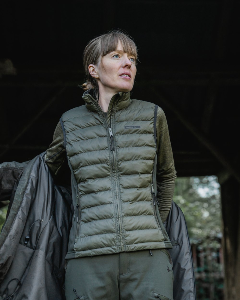 Light Pine Coloured Seeland Womens Therma Waistcoat on forest background