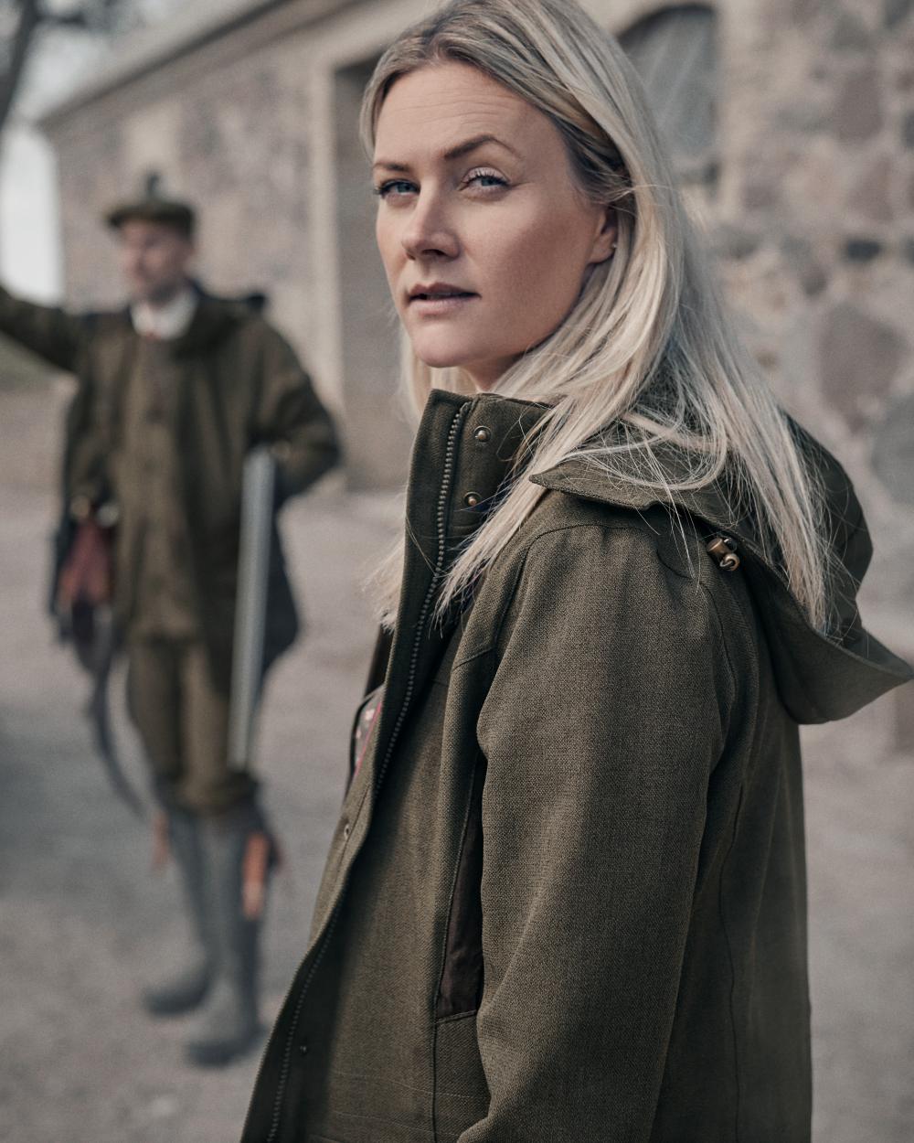 Shaded Olive coloured Seeland Woodcock Advanced Ladies Jacket on outdoor background