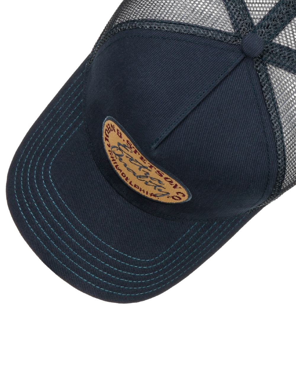 Blue coloured Stetson Vintage Brushed Twill Trucker Cap on white background