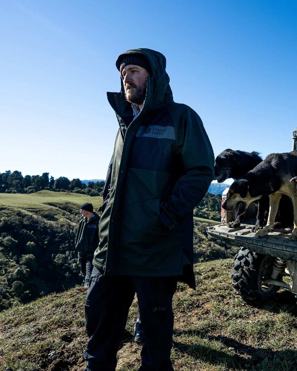 Rosin Black Coloured Stoney Creek Mens Station Jacket on Grassy Field Background