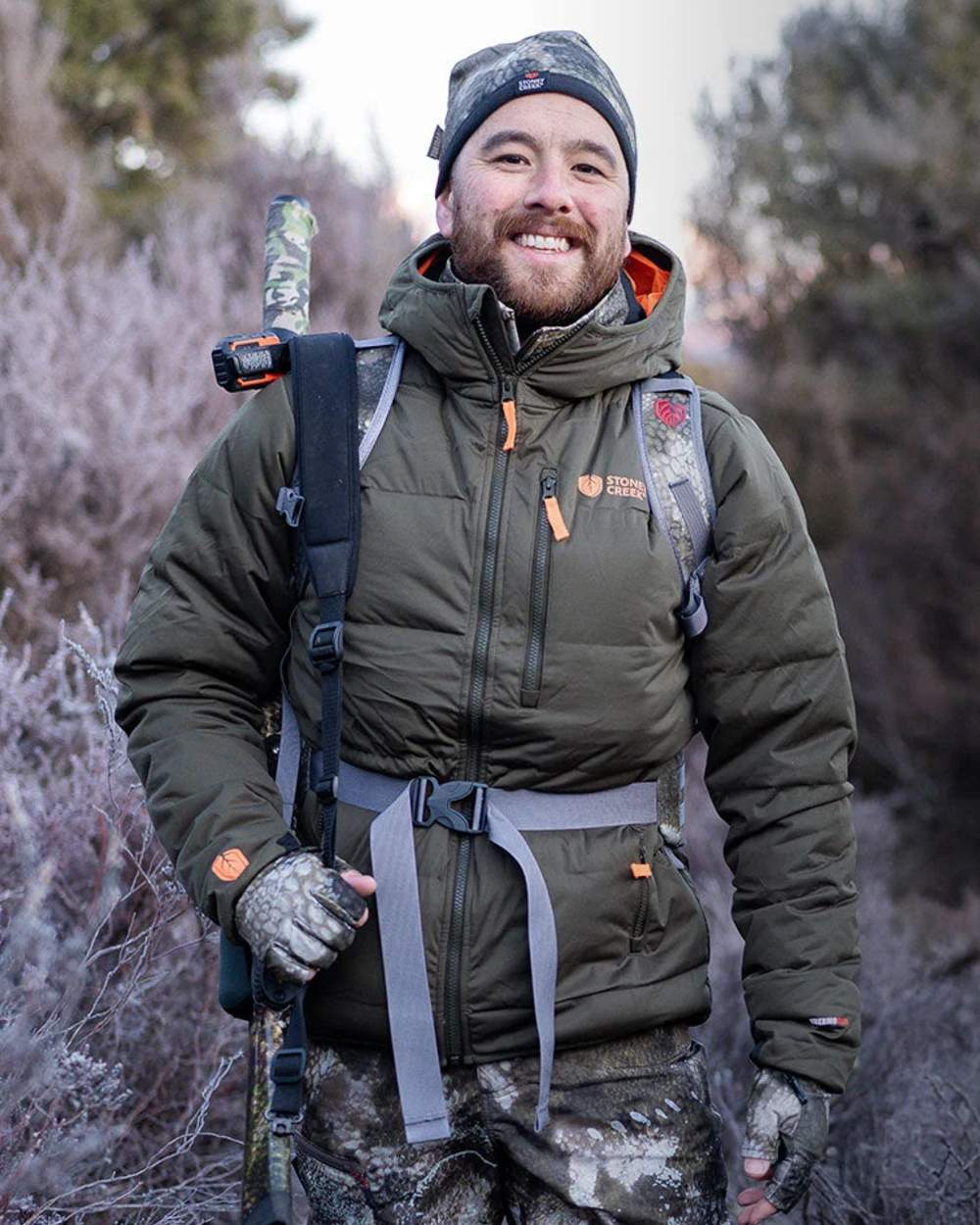 Bayleaf coloured Stoney Creek Mens Thermoflex Jacket on forest background