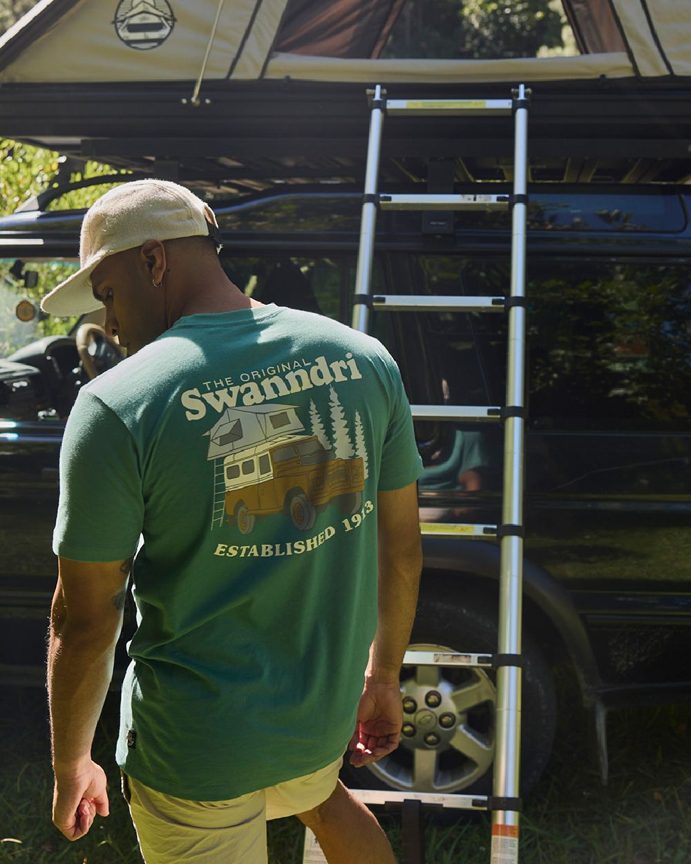 Jade Green Light Taupe Coloured Swanndri Mens Pop Top Printed T Shirt on car background