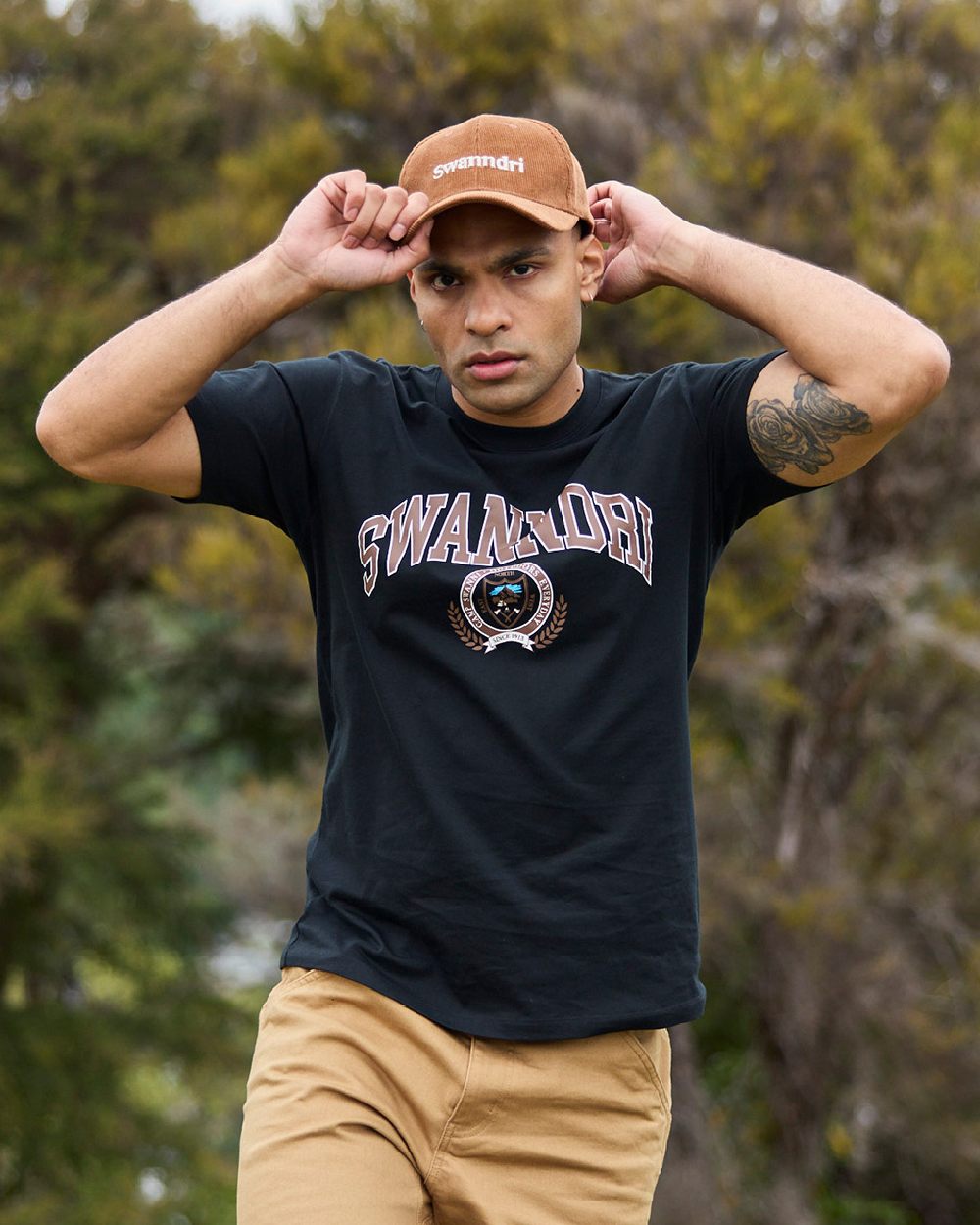 Nutshell Taupe Coloured Swanndri Swanni Corduroy Cap on blurry background