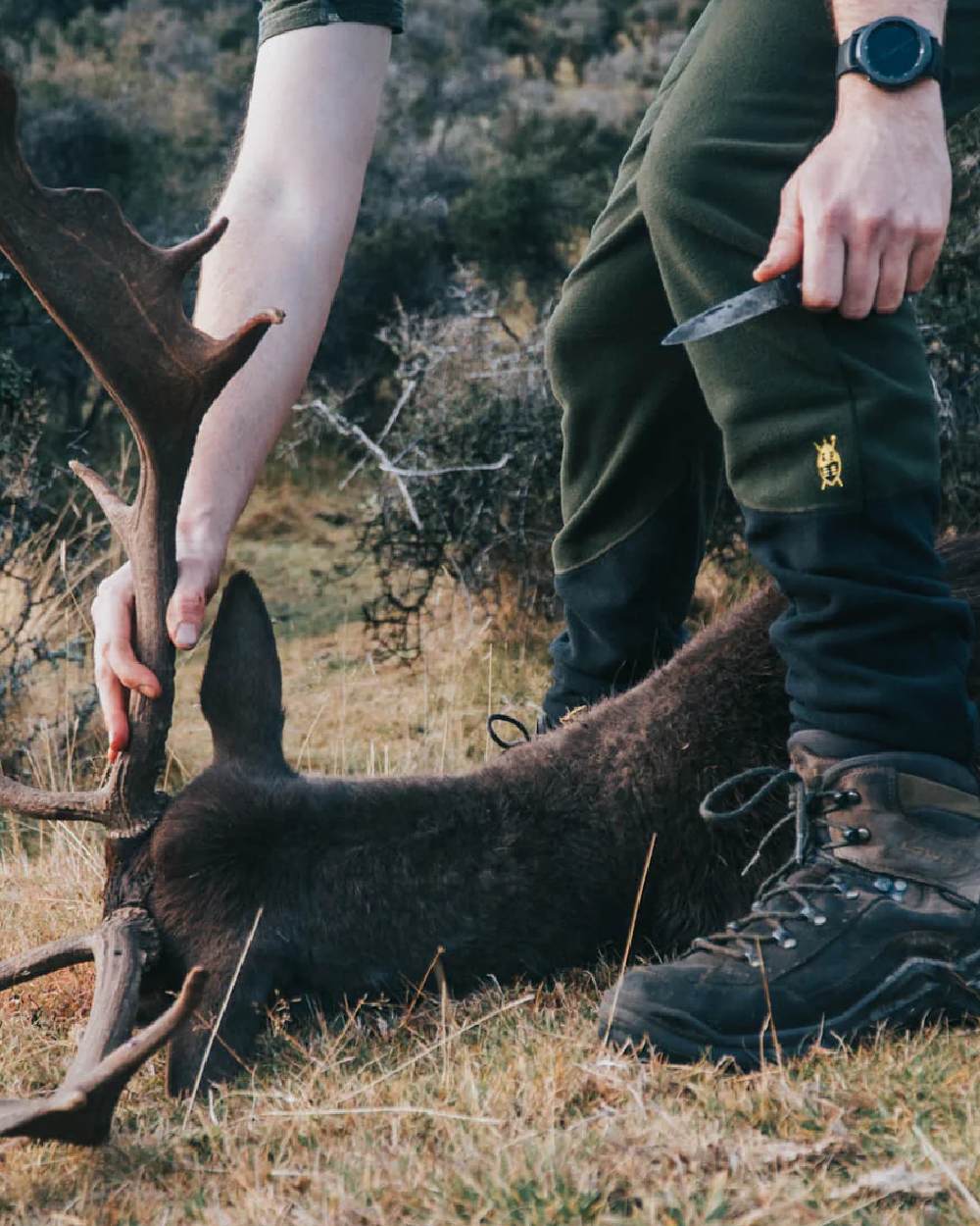 Olive Black coloured Swazi Mens Huttie Pants on blurry background