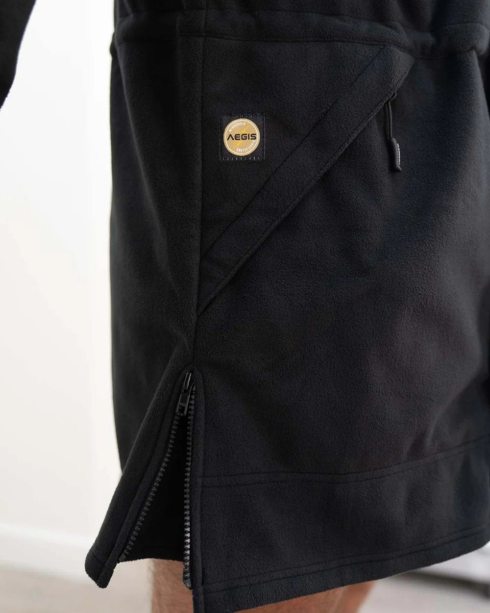 Black coloured Swazi Mens Windriver Jacket on floor background