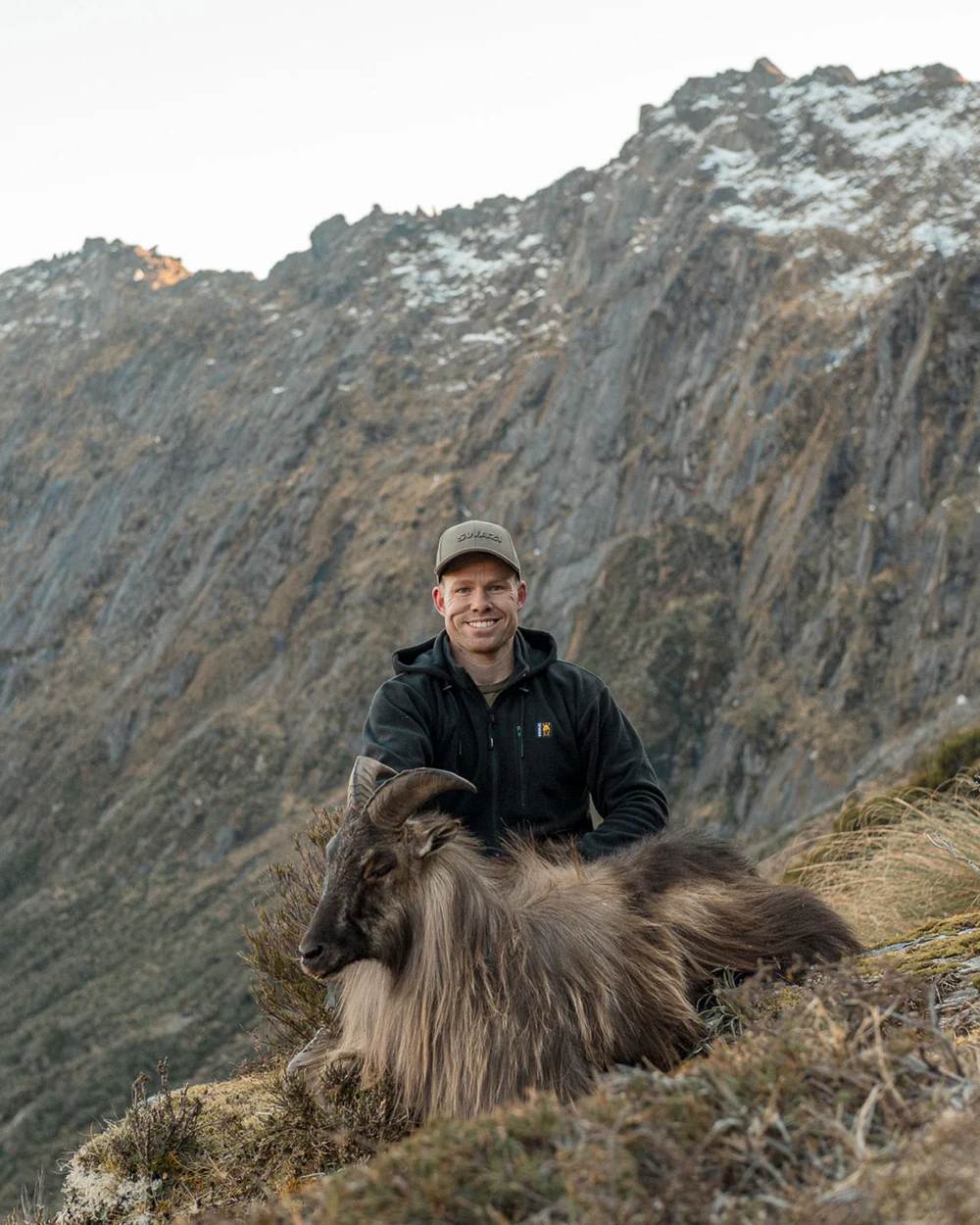 Black Coloured Swazi The Hood on mountain background