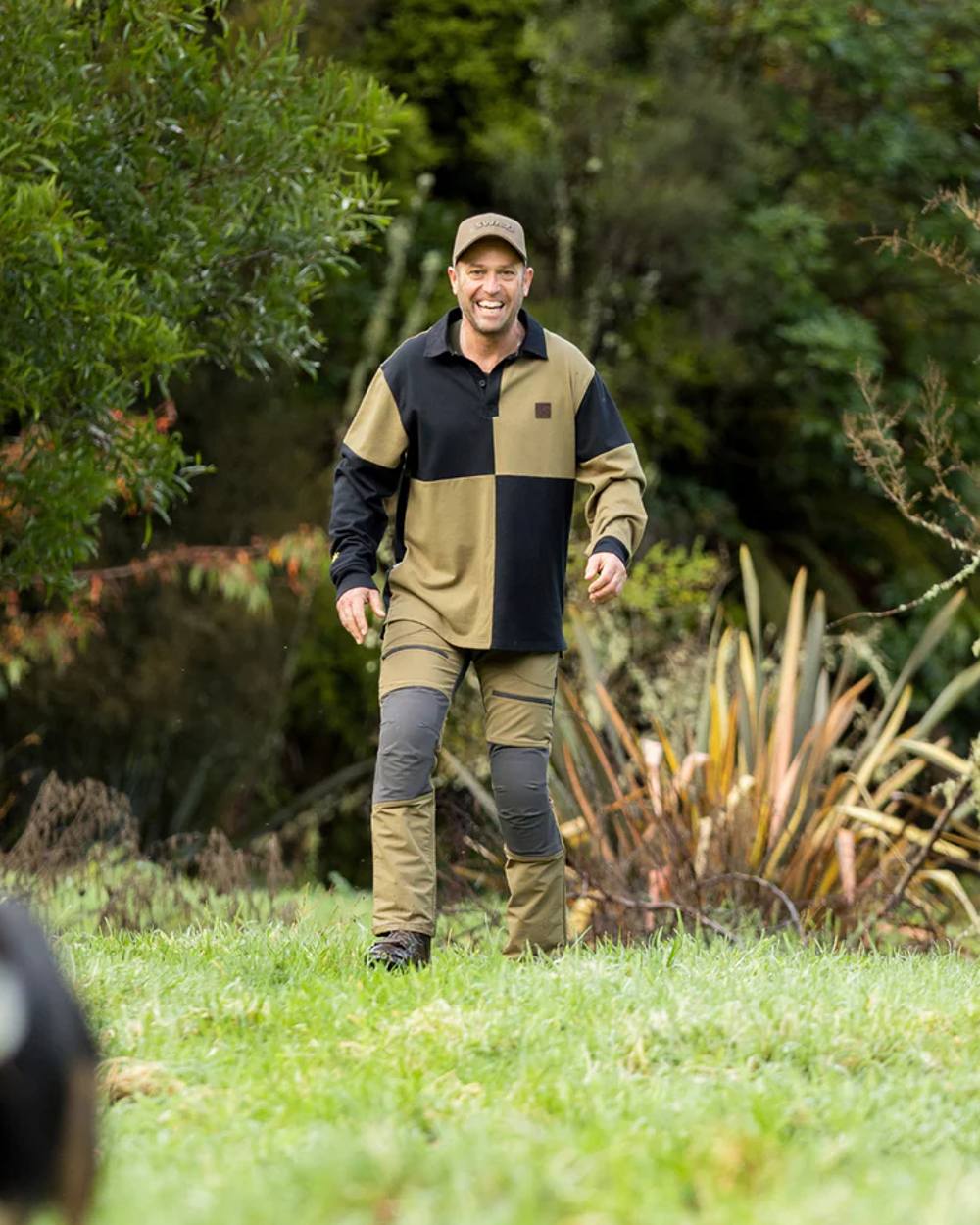 Black Tussock coloured Swazi The Swazi Rugger with trees in background