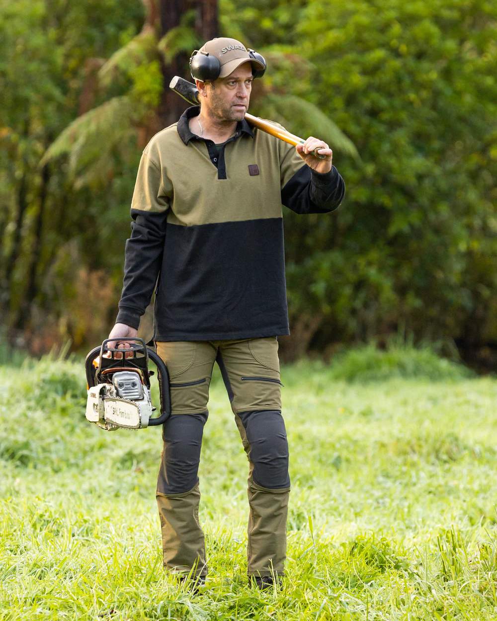 Tussock Black coloured Swazi The Swazi Rugger on green lawn background