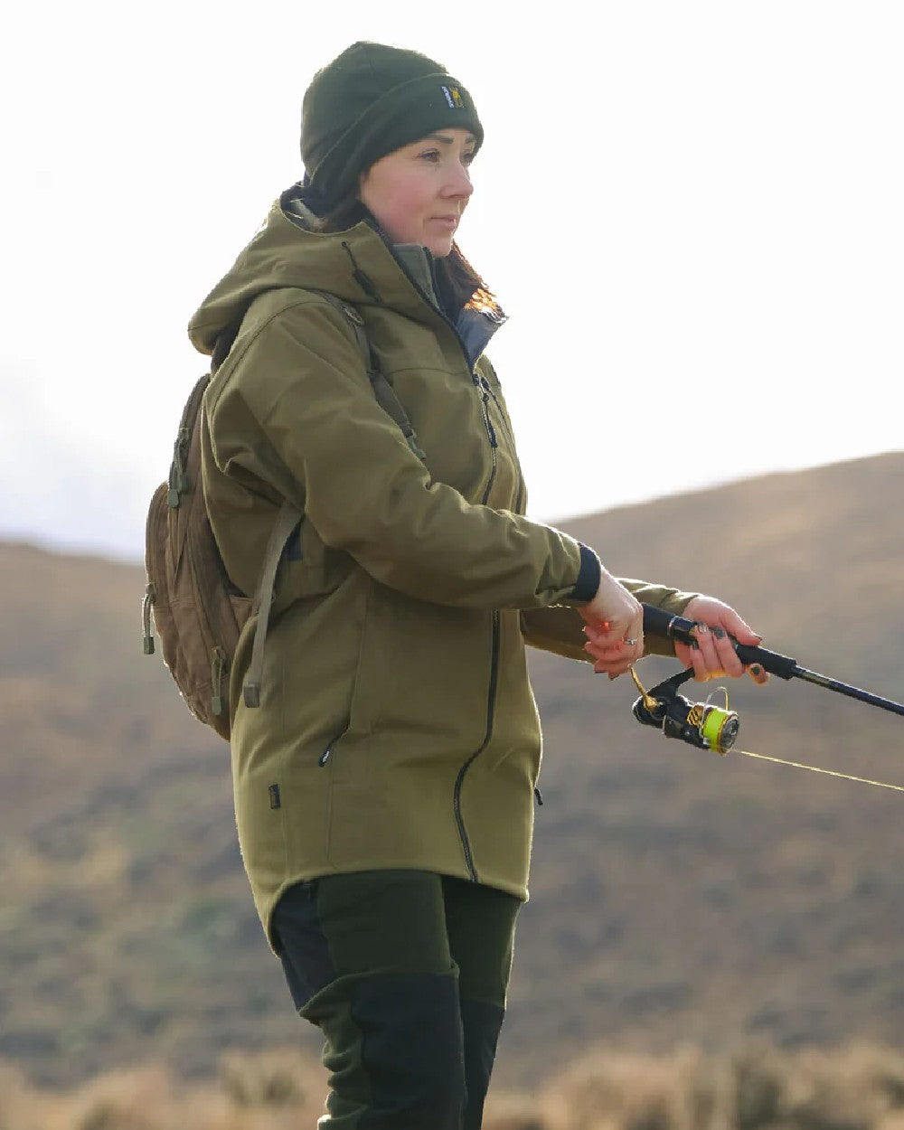 Tussock Green coloured Swazi Womens Artemis Jacket on nature backgorund