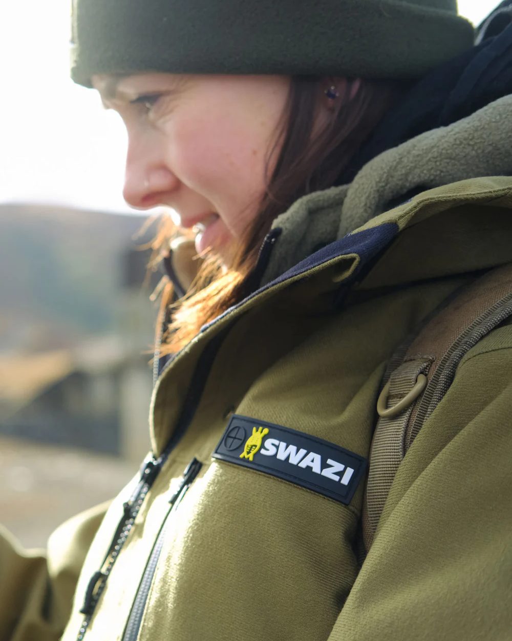 Tussock Green coloured Swazi Womens Artemis Jacket on nature backgorund