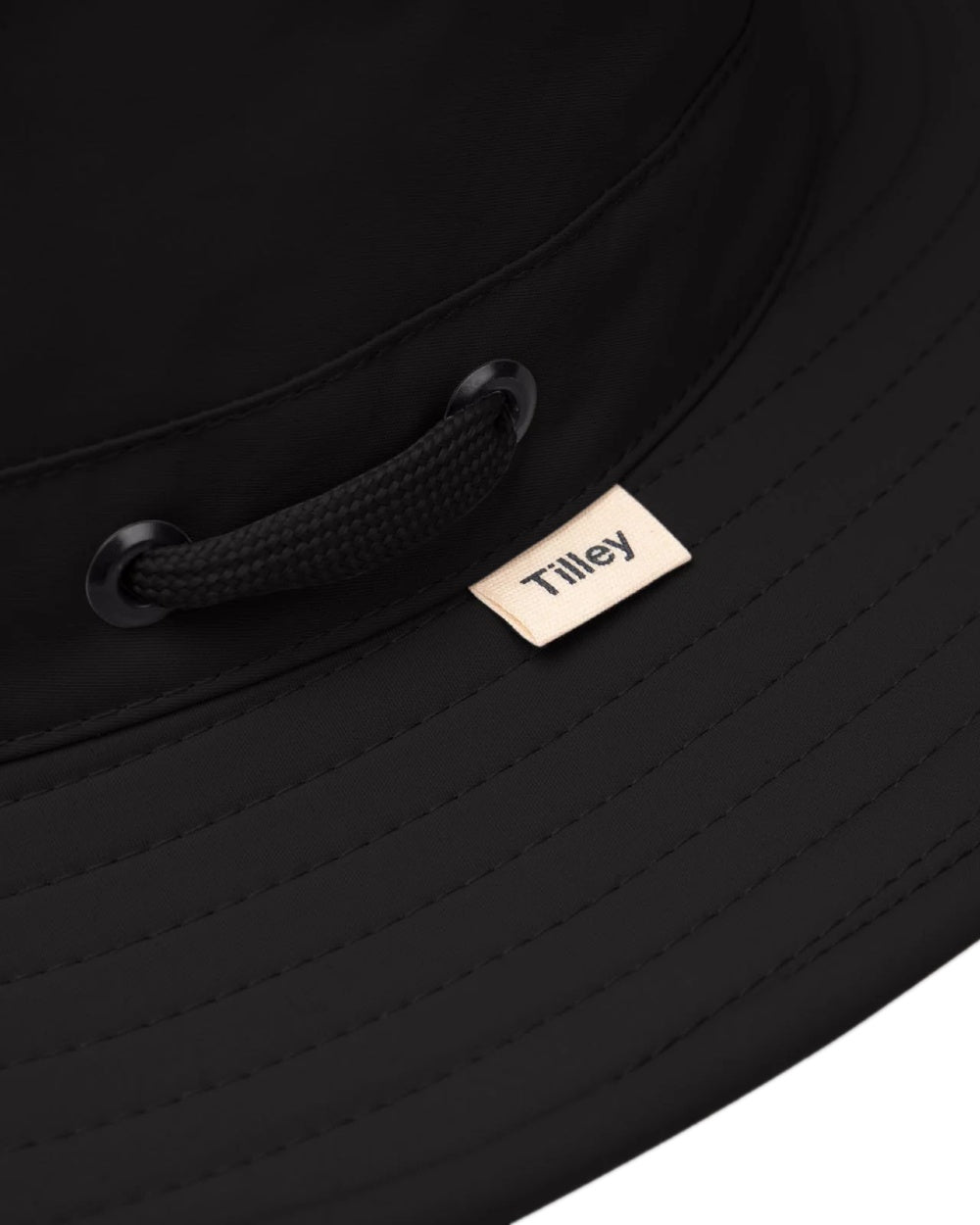 Black Coloured Tilley Airflo Broad Brim Sun Hat on white background