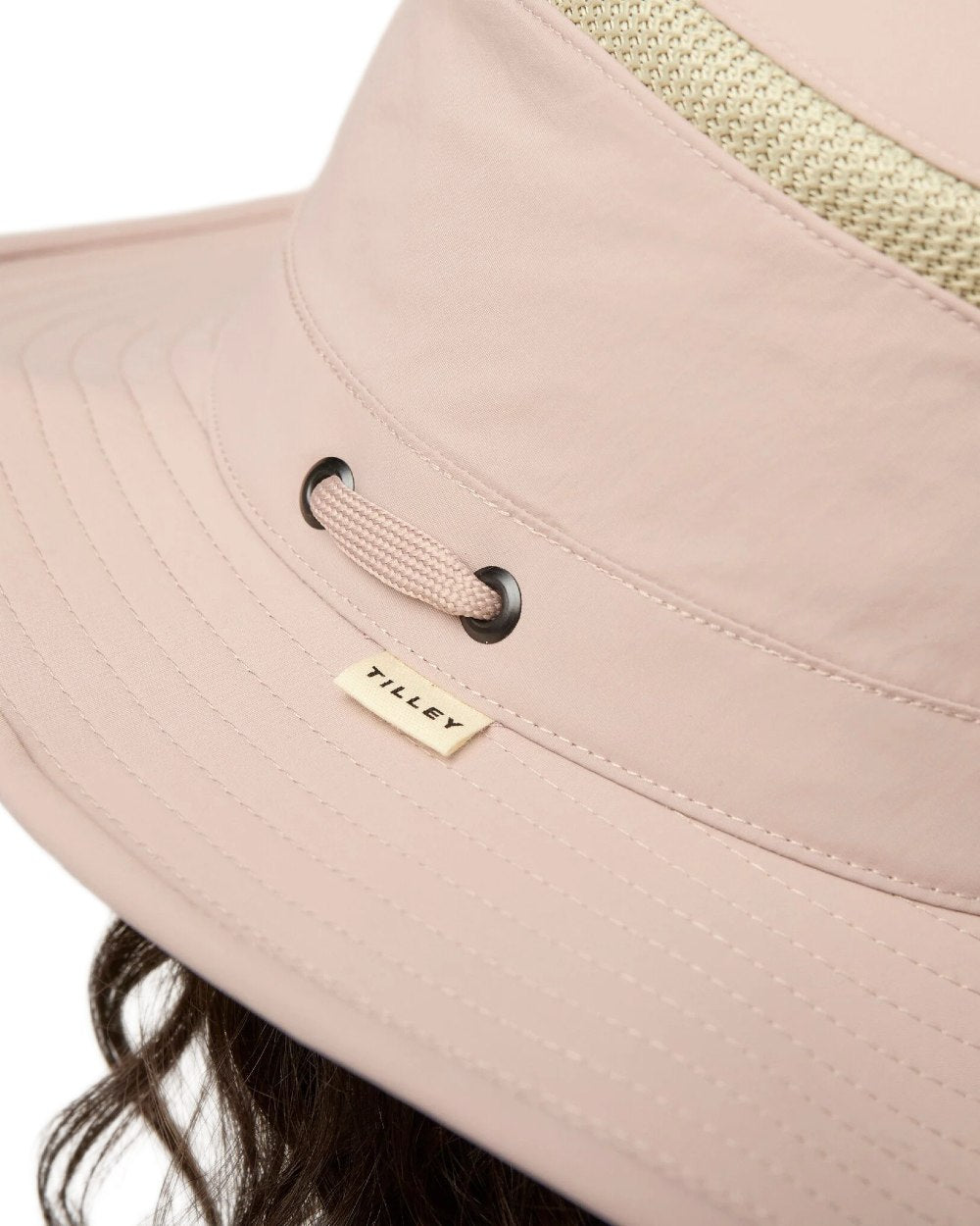 Soft Mauve Coloured Tilley Airflo Broad Brim Sun Hat on white background