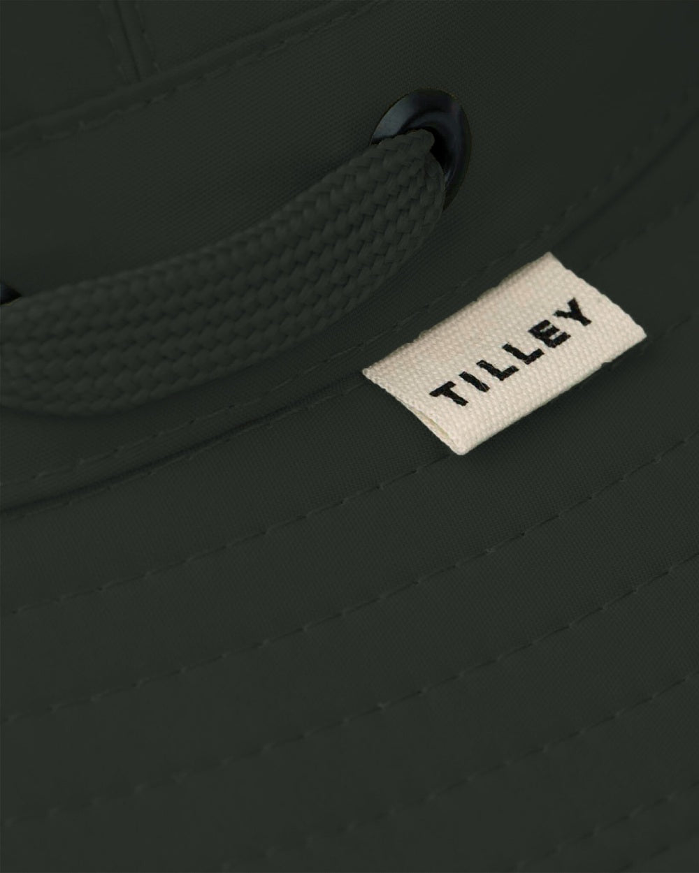 Evergreen coloured Tilley Airflo Medium Brim Recycled Hat on white background