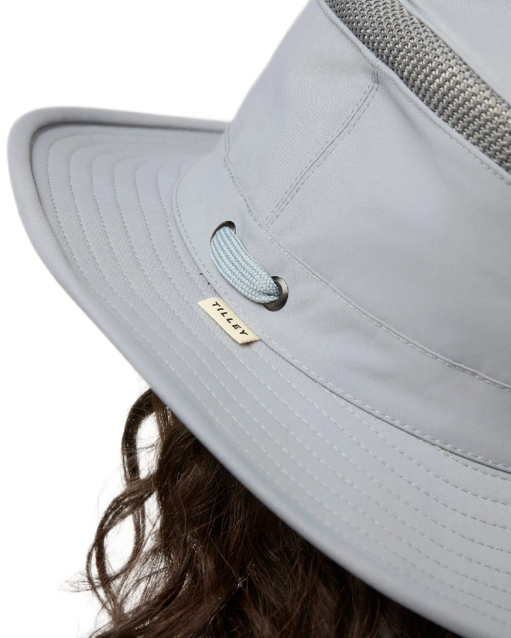 Soft Blue Coloured Tilley Airflo Medium Brim Recycled Hat on white background